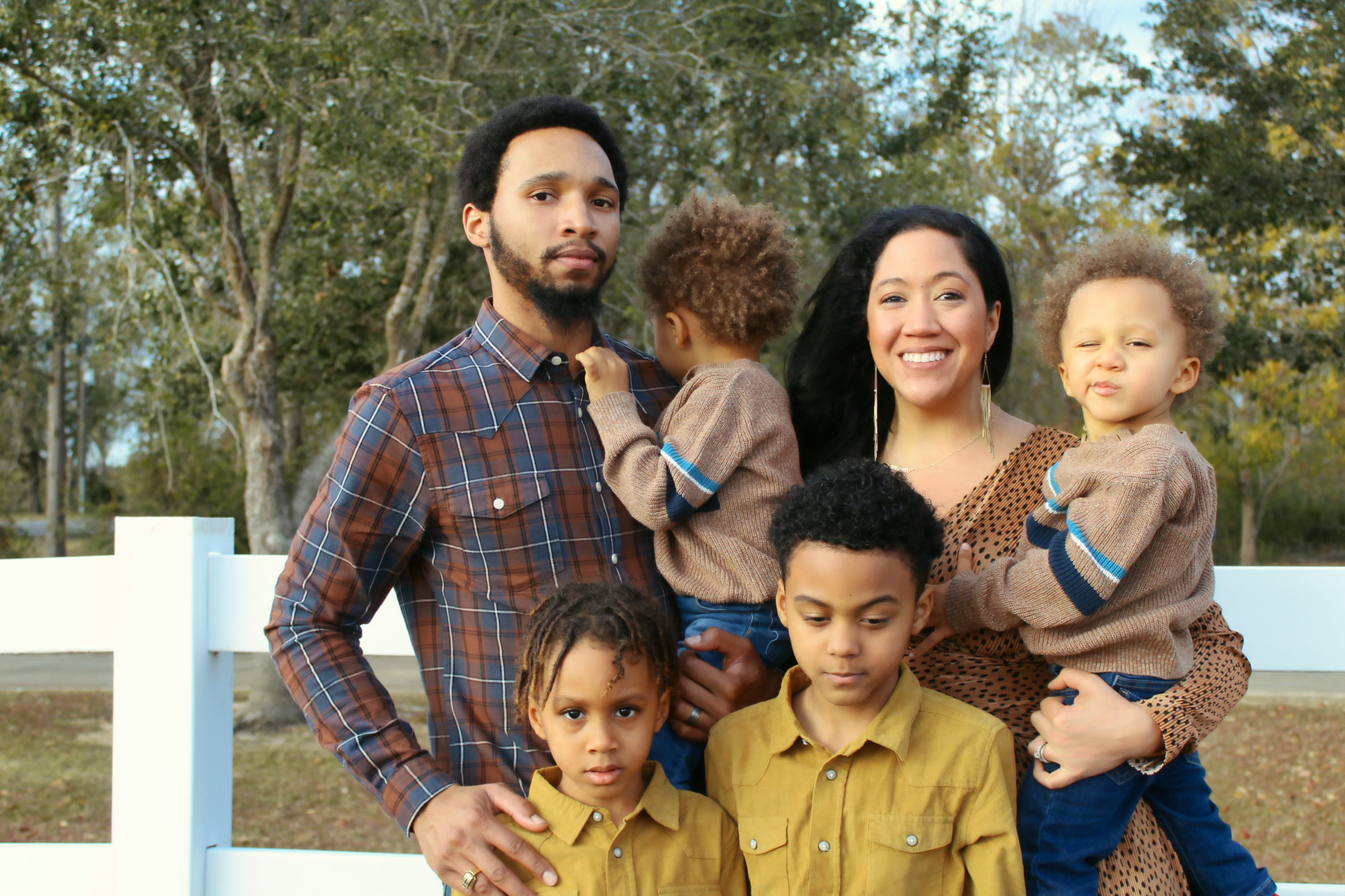 Diverse family showing the importance of insurance protection